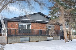 Main Photo: 2111 2 Avenue NW in Calgary: West Hillhurst Semi Detached (Half Duplex) for sale : MLS®# A2031955