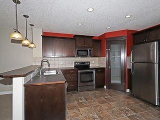 Photo 2: 223 EVANSTON Way NW in Calgary: Evanston House for sale : MLS®# C4178765