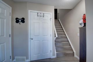 Photo 3: 149 WINDSTONE Avenue SW: Airdrie Row/Townhouse for sale : MLS®# A1033066