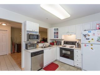 Photo 9: 308 1190 EASTWOOD Street in Coquitlam: North Coquitlam Condo for sale in "LAKE SIDE TERRACE" : MLS®# R2175674