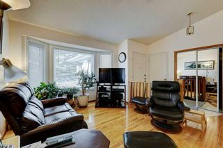 Photo 3: 253 Arbour Cliff Close NW in Calgary: Arbour Lake Semi Detached (Half Duplex) for sale : MLS®# A2126172
