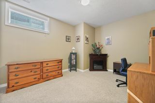 Photo 34: 128 Shawnee Way SW in Calgary: Shawnee Slopes Detached for sale : MLS®# A1259334