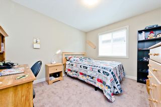 Photo 12: 58 EVERHOLLOW MR SW in Calgary: Evergreen House for sale : MLS®# C4255811