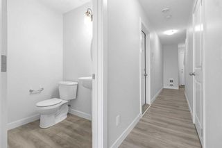Photo 4: 1902 Jumping Pound Common: Cochrane Row/Townhouse for sale : MLS®# A2137478