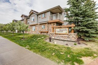 Photo 1: 104 120 Panatella Landing NW in Calgary: Panorama Hills Row/Townhouse for sale : MLS®# A2051554
