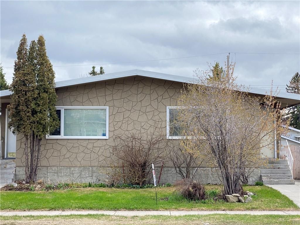 Main Photo: 2039 50 Avenue SW in Calgary: North Glenmore Park Semi Detached for sale : MLS®# C4295796