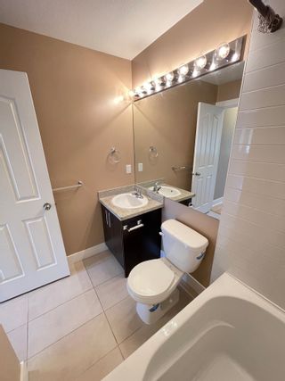 Photo 19: 48 13899 LAUREL Drive in Surrey: Whalley Townhouse for sale in "Emerald Gardens" (North Surrey)  : MLS®# R2704597
