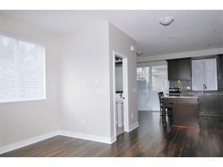 Photo 4: 114 1460 SOUTHVIEW Street in Coquitlam: Burke Mountain Townhouse for sale in "CEDAR CREEK" : MLS®# V940552