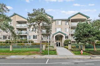 Photo 1: 404 20443 53 Avenue in Langley: Langley City Condo for sale in "Countryside Estates" : MLS®# R2872527