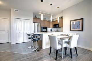 Main Photo: 413 26 Val Gardena View SW in Calgary: Springbank Hill Apartment for sale : MLS®# A1173801