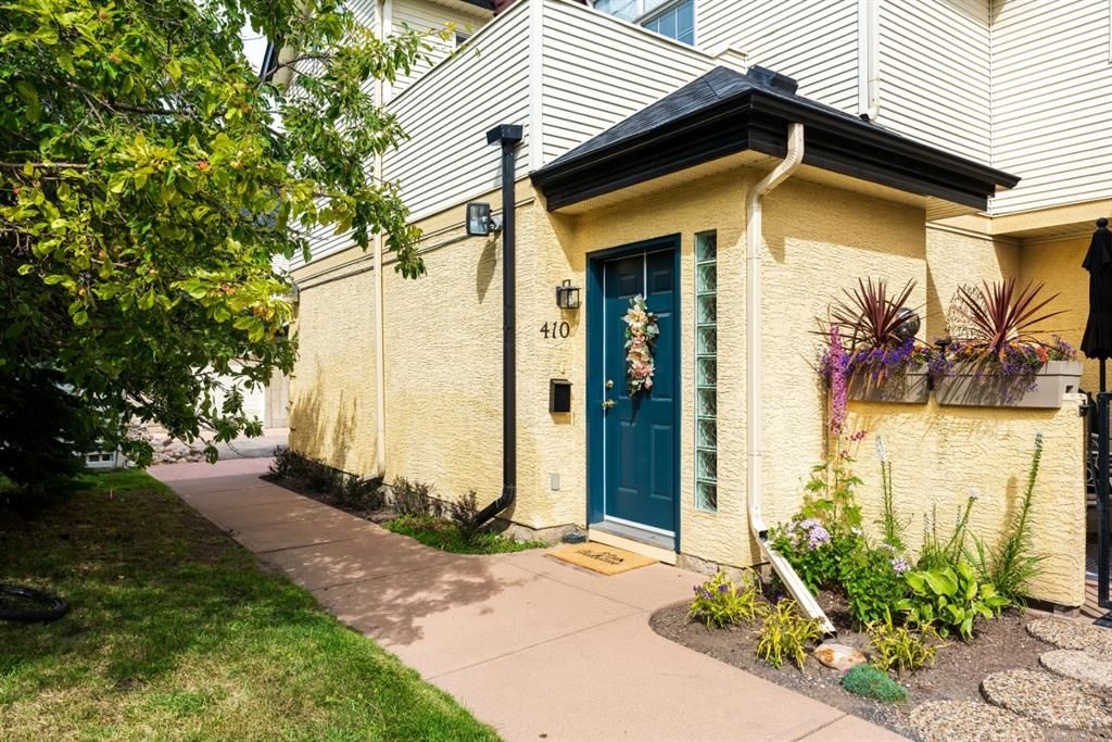 Main Photo: 410 405 32 Avenue NW in Calgary: Mount Pleasant Row/Townhouse for sale : MLS®# A1024091