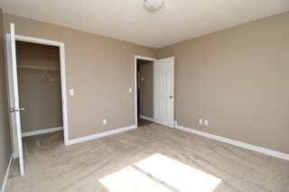 Photo 13: 419 Henricks Drive: Irricana Semi Detached (Half Duplex) for sale : MLS®# A1225048