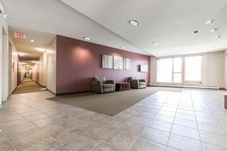 Photo 3: 111 69 Springborough Court SW in Calgary: Springbank Hill Apartment for sale : MLS®# A1238101
