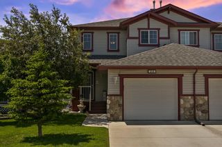 Photo 1: 564 Stonegate Way NW: Airdrie Semi Detached for sale : MLS®# A1235004