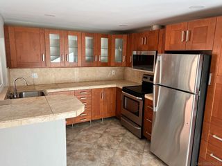 Photo 2: SAN CARLOS Condo for sale : 3 bedrooms : 8721 Lake Murray Blvd #1 in San Diego