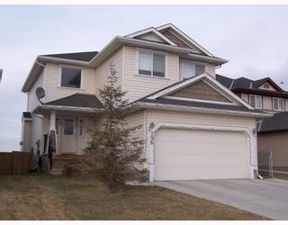 Photo 1: 796 LUXSTONE Landing SW: Airdrie Residential Detached Single Family for sale : MLS®# C3402521