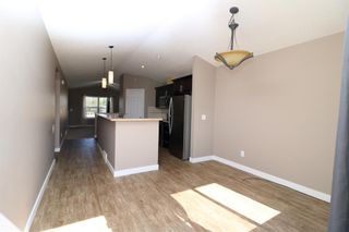 Photo 8: 419 Henricks Drive: Irricana Semi Detached (Half Duplex) for sale : MLS®# A1225048