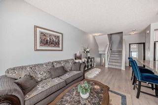 Photo 11: 647 101 Sunset Drive: Cochrane Row/Townhouse for sale : MLS®# A2119340