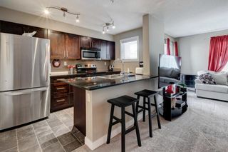 Photo 11: 1304 403 Mackenzie Way SW: Airdrie Apartment for sale : MLS®# A1220279