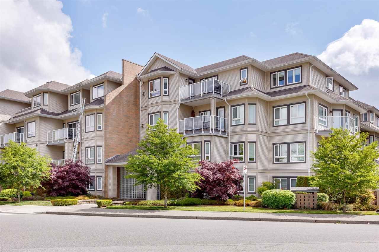 Main Photo: 107 8142 120A Street in Surrey: Queen Mary Park Surrey Condo for sale in "Sterling Court" : MLS®# R2583529