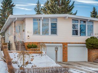 Photo 1: 2611 CANMORE RD NW in Calgary: Banff Trail House for sale : MLS®# C4146643