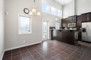 Photo 9: 2210 Wentworth Villas SW in Calgary: West Springs Row/Townhouse for sale : MLS®# A2106838