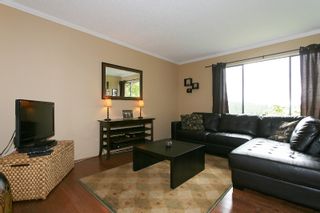 Photo 2: 557 CARLSEN Place in Port Moody: North Shore Pt Moody Townhouse for sale in "EAGLE POINT" : MLS®# V835962
