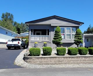 Photo 1: 13 27111 0 Avenue in Langley: Aldergrove Langley Manufactured Home for sale in "Pioneer Park" : MLS®# R2695490