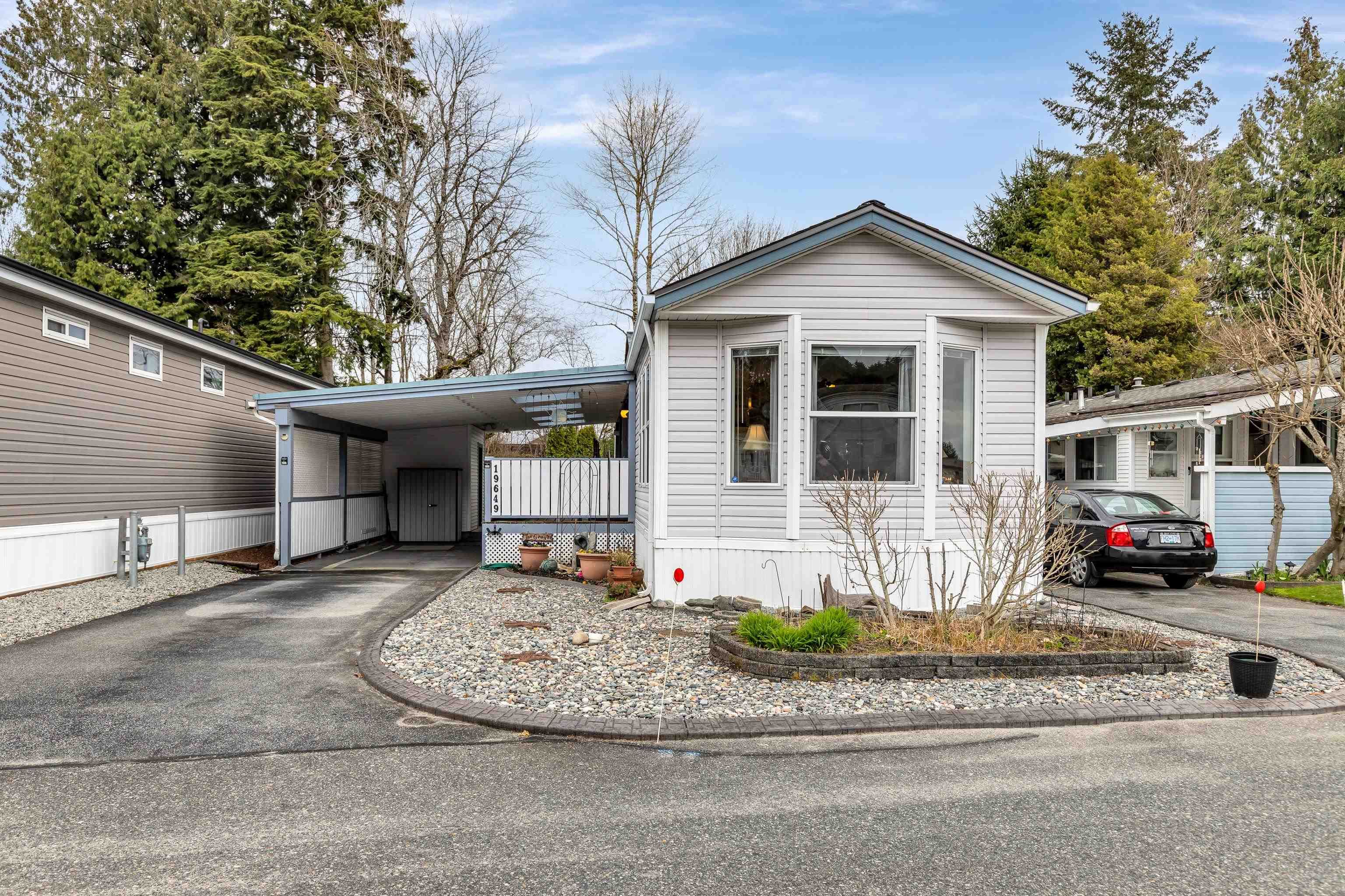 Main Photo: 19649 POPLAR Drive in Pitt Meadows: Central Meadows Manufactured Home for sale : MLS®# R2768724