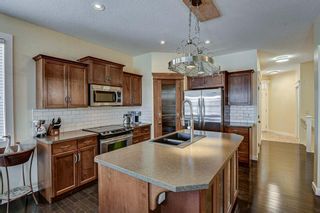Photo 10: 303 Crystal Green Rise: Okotoks Semi Detached for sale : MLS®# A1184639