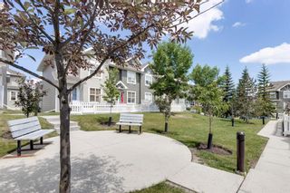Photo 5: 208 Toscana Gardens NW in Calgary: Tuscany Row/Townhouse for sale : MLS®# A1127708
