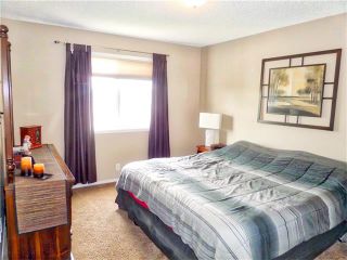Photo 29: 1010 BRIDLEMEADOWS Manor SW in Calgary: Bridlewood House for sale : MLS®# C4065914