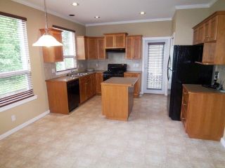 Photo 2: 6258 135B ST in Surrey: Panorama Ridge House for sale in "Heritage Woods" : MLS®# F1312156