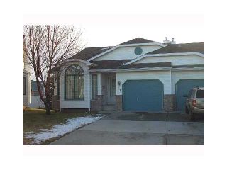 Photo 1: 66 RIVERCREST Villa SE in Calgary: Riverbend Residential Attached for sale : MLS®# C3648564