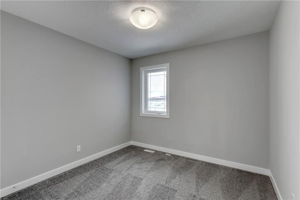 Photo 24: Photos: 56 Creekside Green SW in Calgary: C-168 Detached for sale : MLS®# C4286836