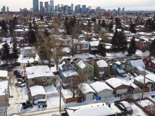 Photo 2: 250 23 Avenue NE in Calgary: Tuxedo Park Detached for sale : MLS®# A2032800