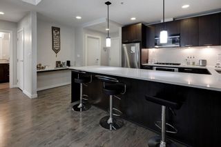 Photo 9: 134 721 4 Street NE in Calgary: Renfrew Apartment for sale : MLS®# A2131372