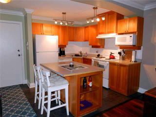 Photo 3: 106 1428 PARKWAY Boulevard in Coquitlam: Westwood Plateau Condo for sale in "MONTREAU" : MLS®# V1097817