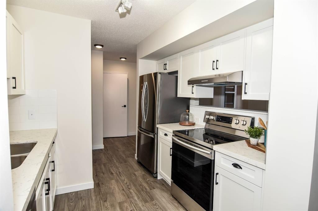 Photo 11: Photos: 213 2204 1 Street SW in Calgary: Mission Apartment for sale : MLS®# A1032440