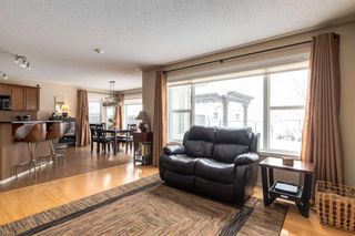 Photo 7: 200 Cougartown Close SW in Calgary: Cougar Ridge Detached for sale : MLS®# A2124049