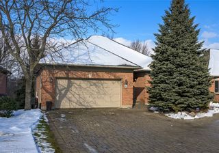 Photo 1: 8 50 NORTHUMBERLAND Road in London: North L Residential for sale (North)  : MLS®# 40201450