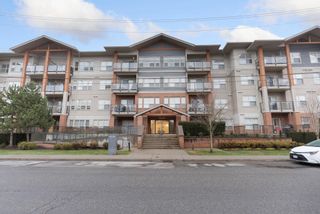 Photo 1: 205 20219 54A Avenue in Langley: Langley City Condo for sale in "Suede" : MLS®# R2651938