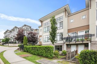 Photo 1: 202 9987 E BARNSTON Drive in Surrey: Fraser Heights Townhouse for sale in "HIGHCREST" (North Surrey)  : MLS®# R2897091
