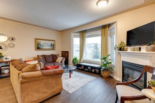 Photo 2: 128 Country Hills Gardens NW in Calgary: Country Hills Row/Townhouse for sale : MLS®# A1157775