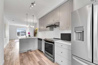 Photo 9: 102 15 Evanscrest Park NW in Calgary: Evanston Row/Townhouse for sale : MLS®# A2128204