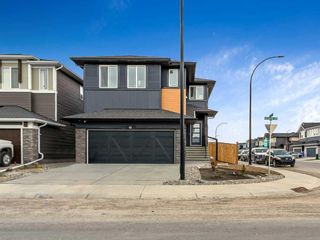 Photo 1: 41 Creekside Avenue SW in Calgary: C-168 Detached for sale : MLS®# A2124294