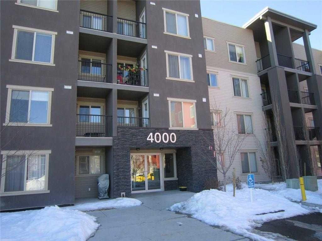 Main Photo: 4307 403 Mackenzie Way SW: Airdrie Apartment for sale : MLS®# A2081107