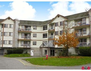 Photo 1: 116 5710 201ST Street in Langley: Langley City Condo for sale in "White Oaks" : MLS®# F2728346