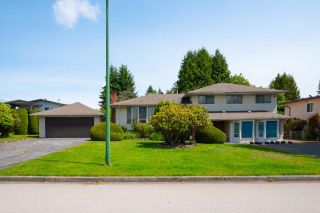 Photo 1: 7449 DORCHESTER Drive in Burnaby: Government Road House for sale in "Government Drive" (Burnaby North)  : MLS®# R2891297