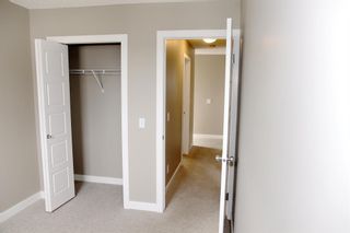 Photo 19: 181 Pantego Lane NW in Calgary: Panorama Hills Row/Townhouse for sale : MLS®# A2053463